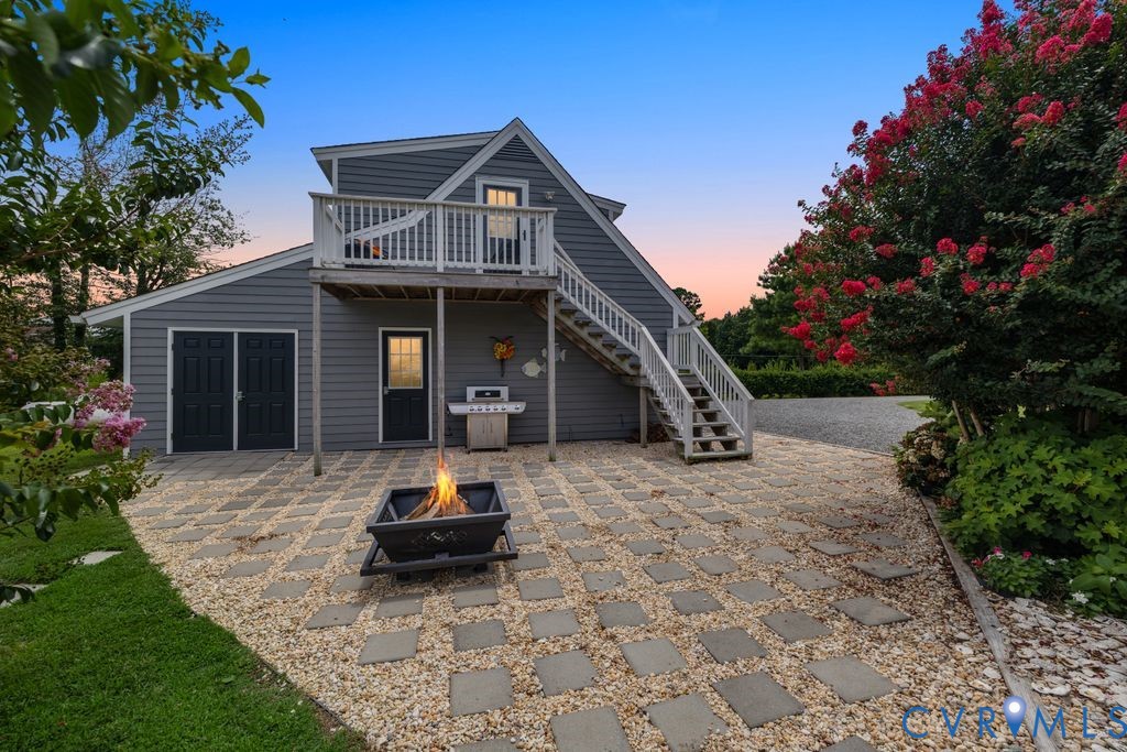 2082 Ocran Road White Stone, VA 22578 - Photo 2 of 50 a front view of a house with a yard