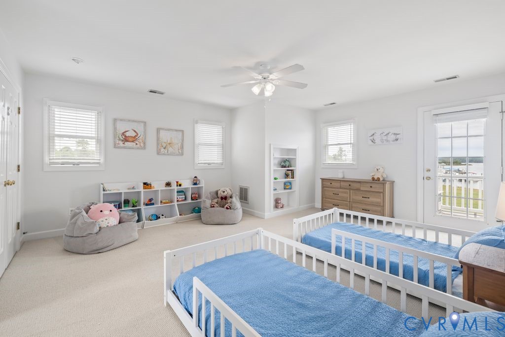 2082 Ocran Road White Stone, VA 22578 - Photo 22 of 50 a bedroom with furniture and a window