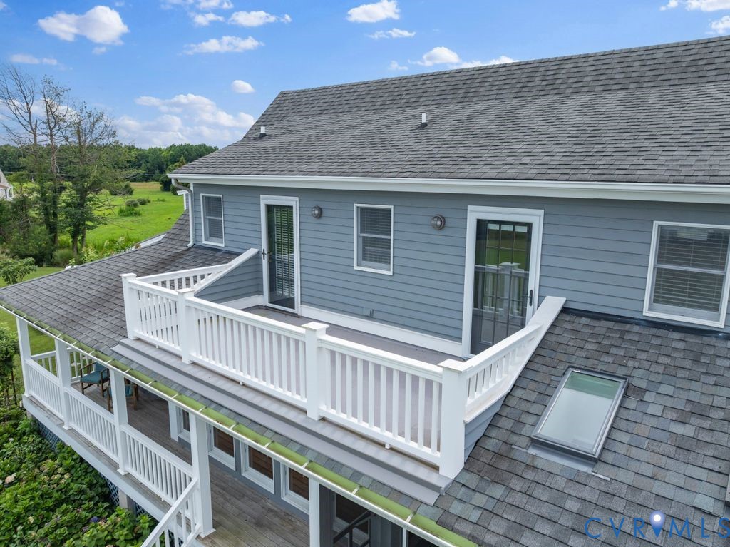 2082 Ocran Road White Stone, VA 22578 - Photo 37 of 50 a front view of a house with balcony