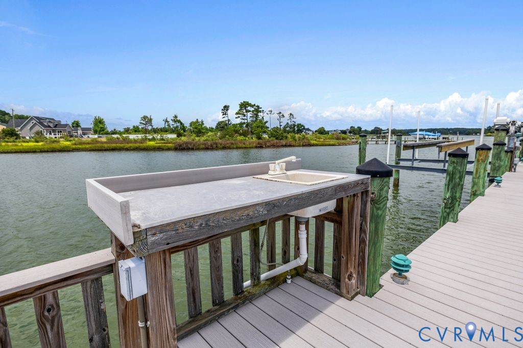 2082 Ocran Road White Stone, VA 22578 - Photo 40 of 50 a balcony with wooden floor and city view