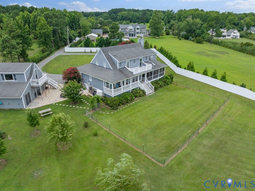 2082 Ocran Road White Stone, VA 22578 - Photo 50 of 50 an aerial view of residential houses with outdoor space and trees