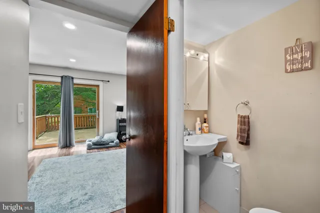 a bathroom with a sink double vanity and a mirror