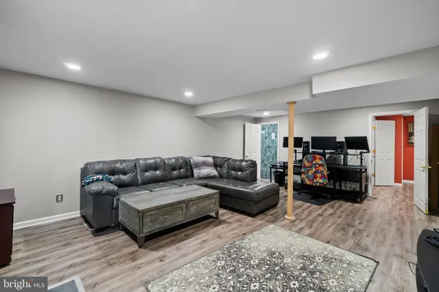 a living room with furniture and a couch