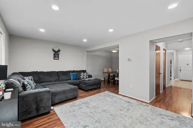 a living room with furniture and a couch