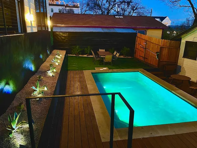 a view of a chairs and table in the patio