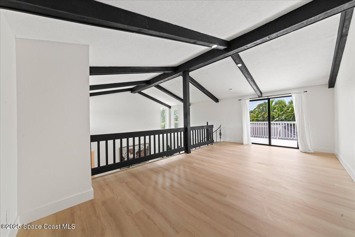 720 Wing Foot Lane Melbourne, FL 32940 - Photo 19 of 45 a view of an empty room with a window