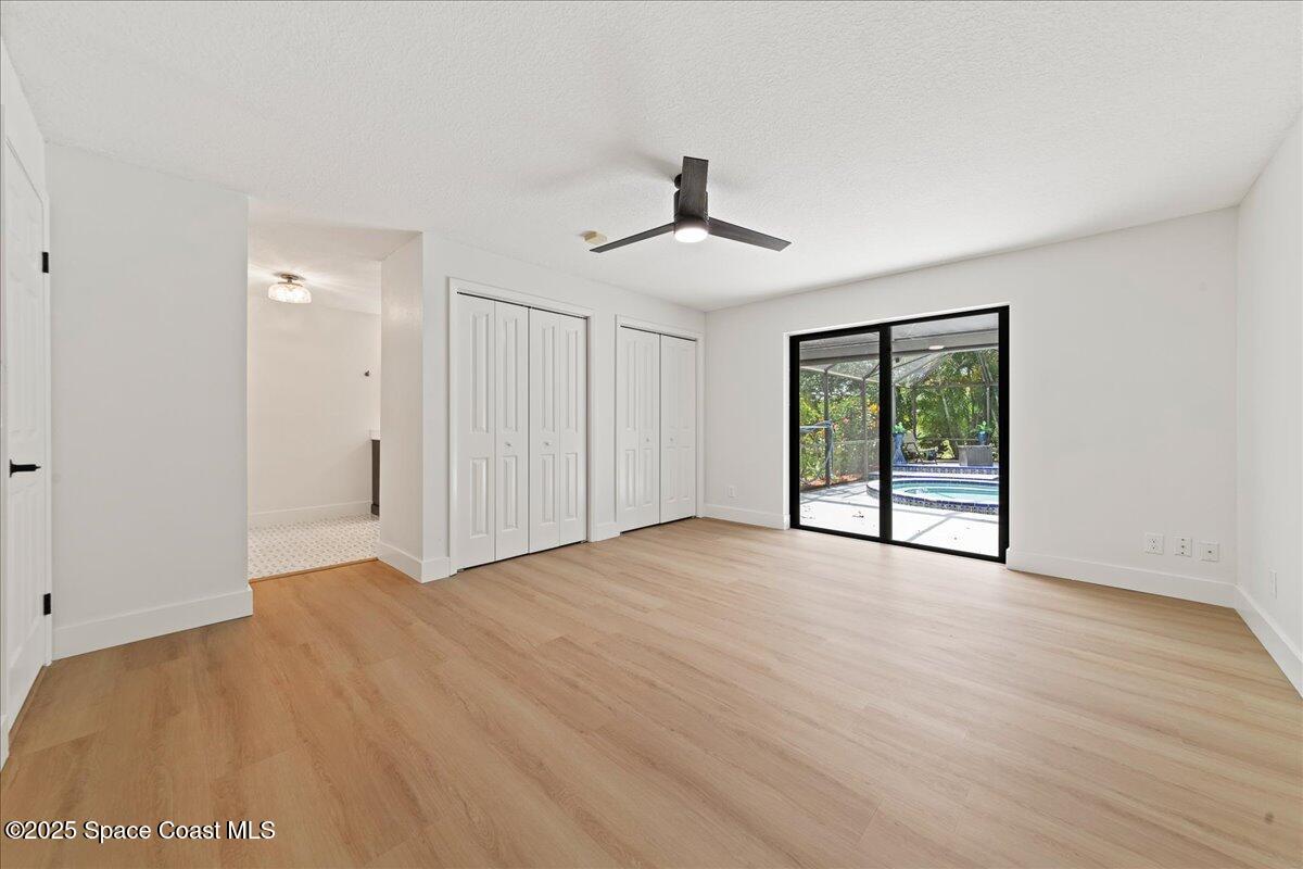 720 Wing Foot Lane Melbourne, FL 32940 - Photo 21 of 45 a view of an empty room with a window