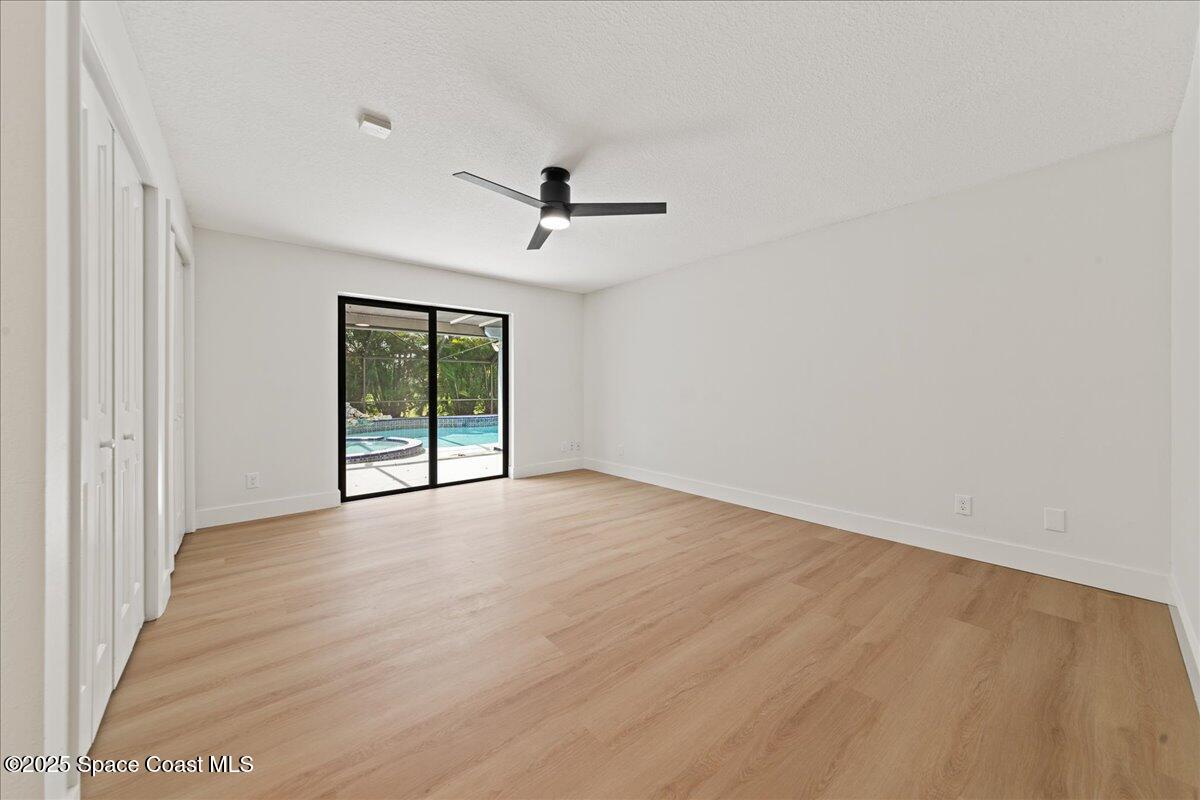 720 Wing Foot Lane Melbourne, FL 32940 - Photo 22 of 45 a view of an empty room with a window