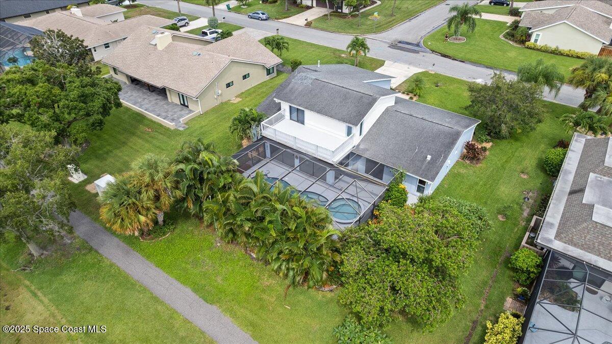 720 Wing Foot Lane Melbourne, FL 32940 - Photo 24 of 45 an aerial view of a house with a garden