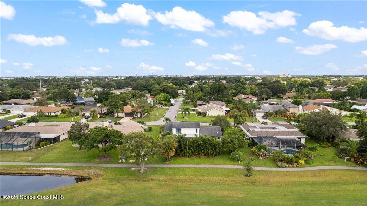 720 Wing Foot Lane Melbourne, FL 32940 - Photo 26 of 45 a view of a lake