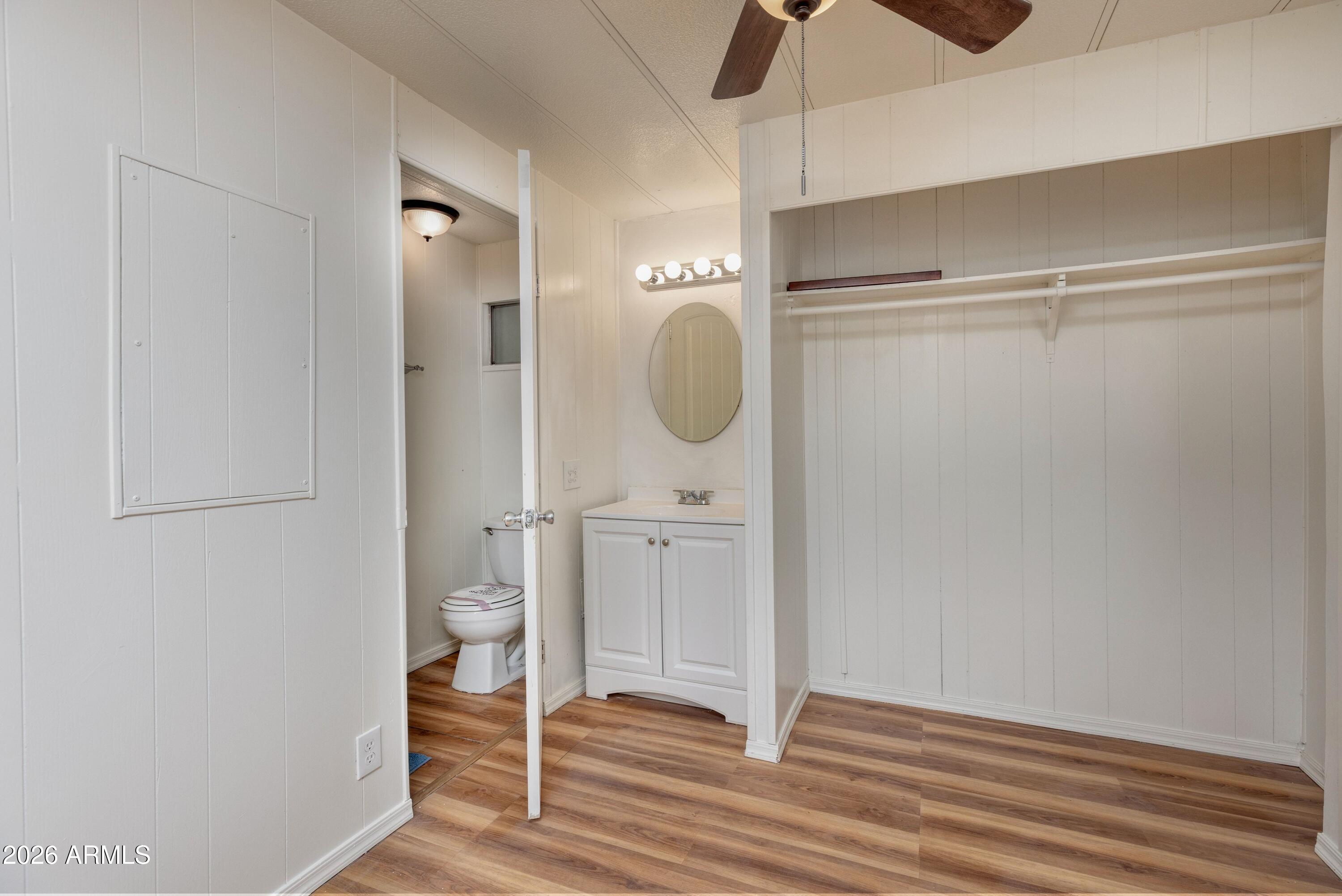 503 West Johnson Drive Payson, AZ 85541 - Photo 14 of 24 a bathroom with a glass shower door a sink and a mirror