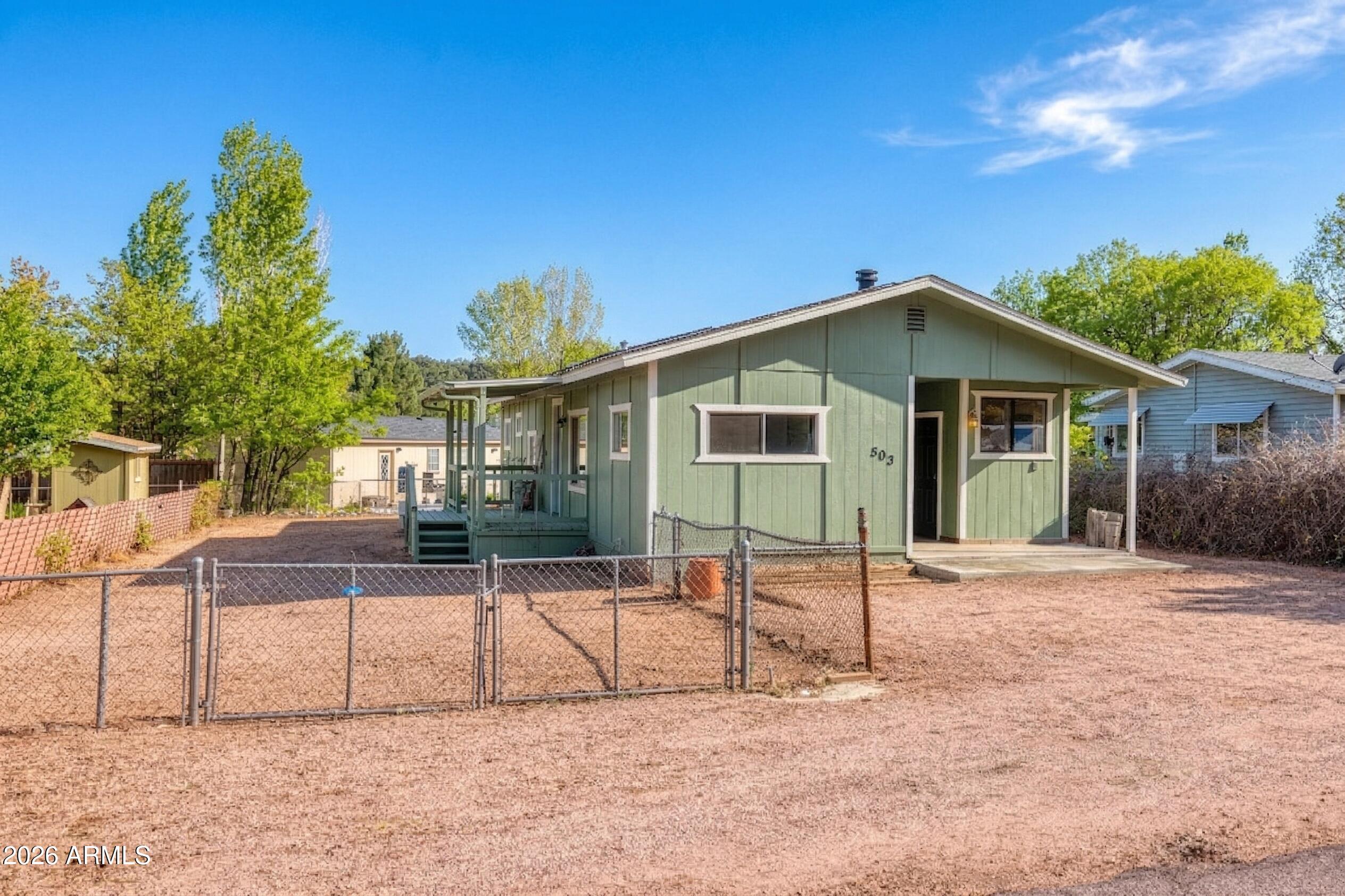 503 West Johnson Drive Payson, AZ 85541 - Photo 16 of 24 a view of a house with a backyard