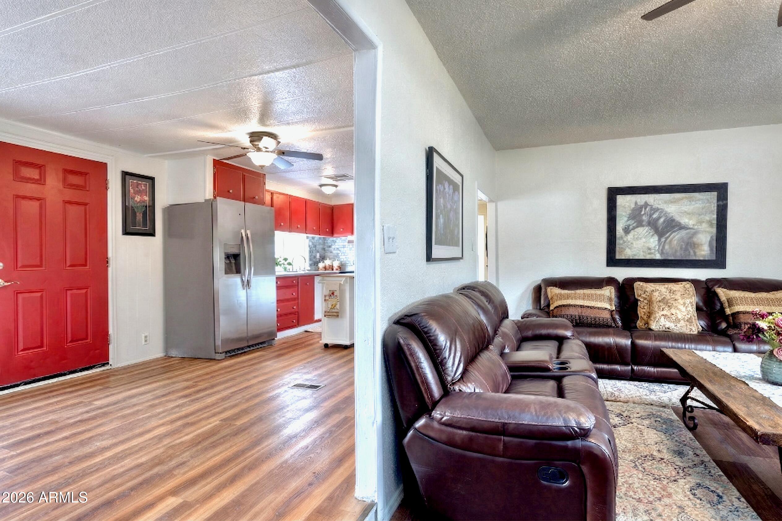 503 West Johnson Drive Payson, AZ 85541 - Photo 5 of 24 a living room with furniture and a refrigerator