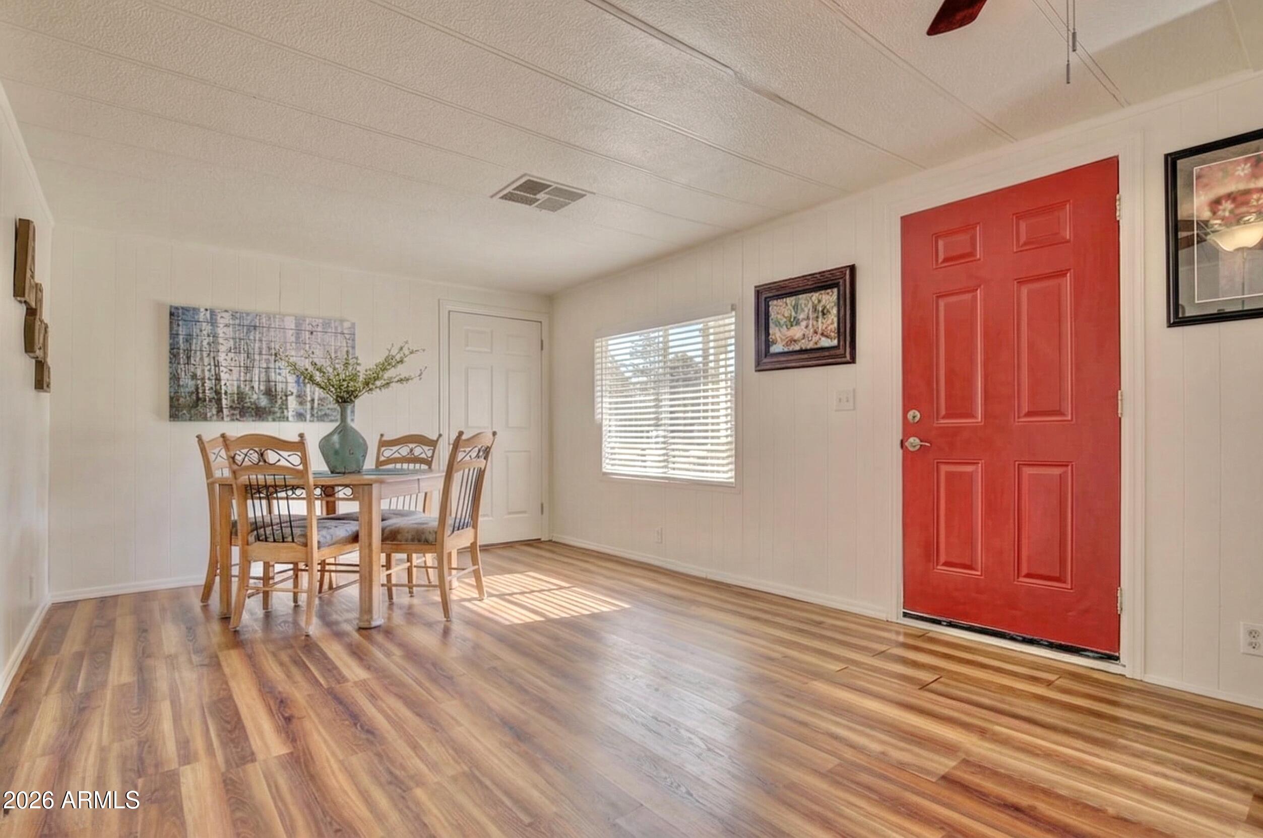503 West Johnson Drive Payson, AZ 85541 - Photo 6 of 24 a dining room with furniture and wooden floor