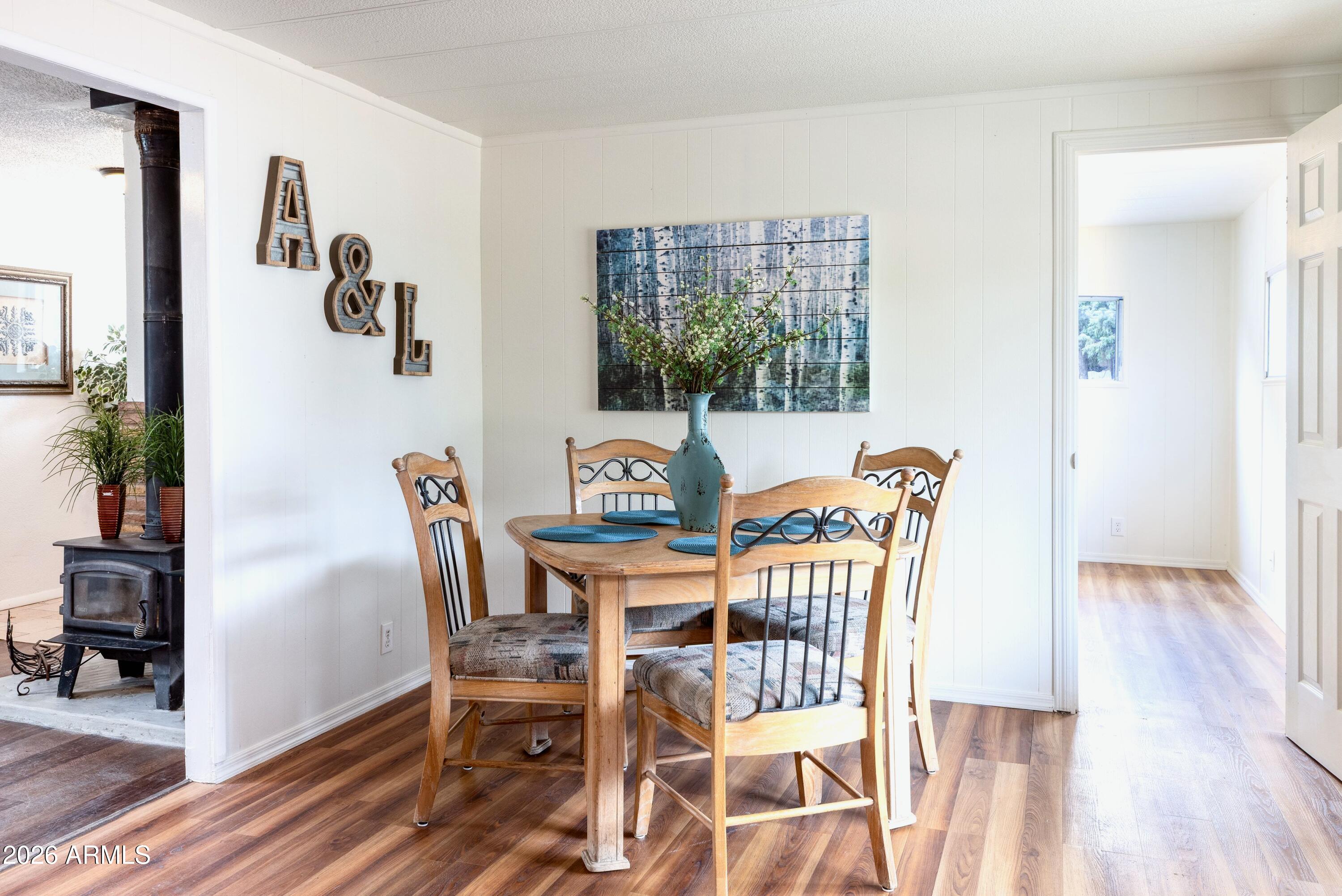 503 West Johnson Drive Payson, AZ 85541 - Photo 7 of 24 a view of a dining room with furniture window and wooden floor