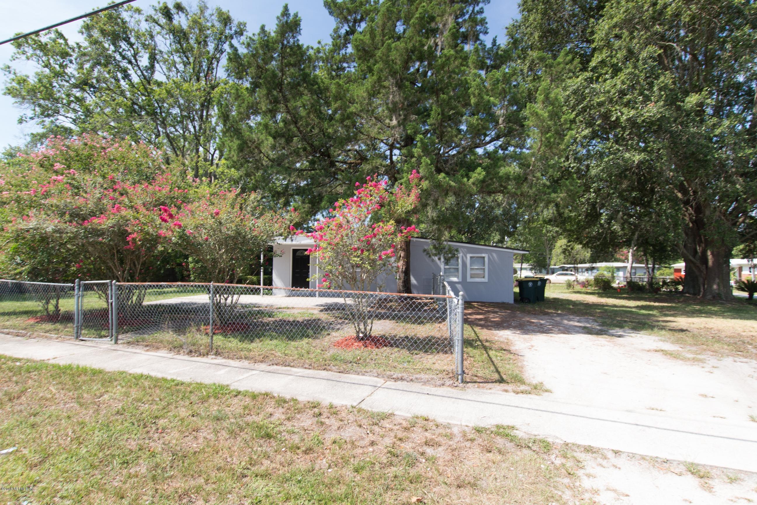 1702 Cortez Road Jacksonville, FL 32246 - Photo 23 of 24 a view of a water fountain in front of a house