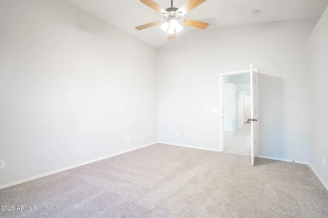 a bathroom with a toilet and a bathtub