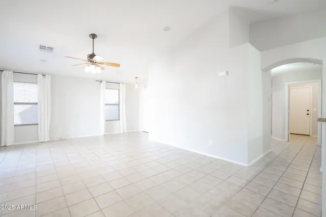 a view of a kitchen with a stove and a refrigerator