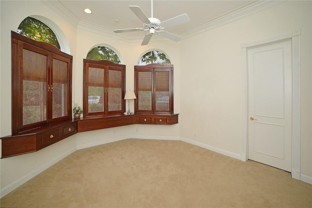 6039 Northwest 32nd Avenue Boca Raton, FL 33496 - Photo 11 of 18 wooden floor in an empty room with a window