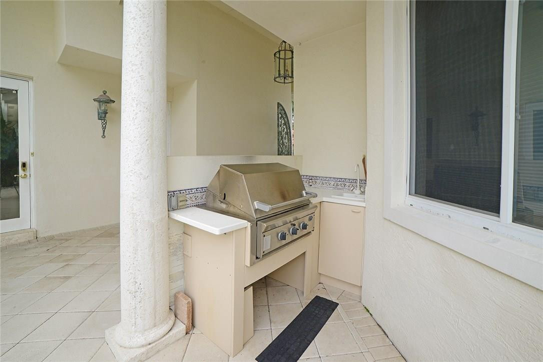 6039 Northwest 32nd Avenue Boca Raton, FL 33496 - Photo 5 of 18 a bathroom with a sink toilet and shower