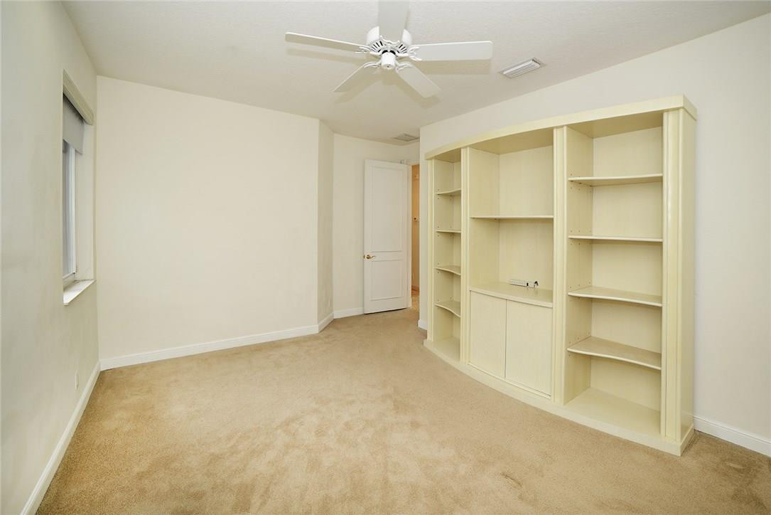 6039 Northwest 32nd Avenue Boca Raton, FL 33496 - Photo 10 of 18 a view of an empty room with a window