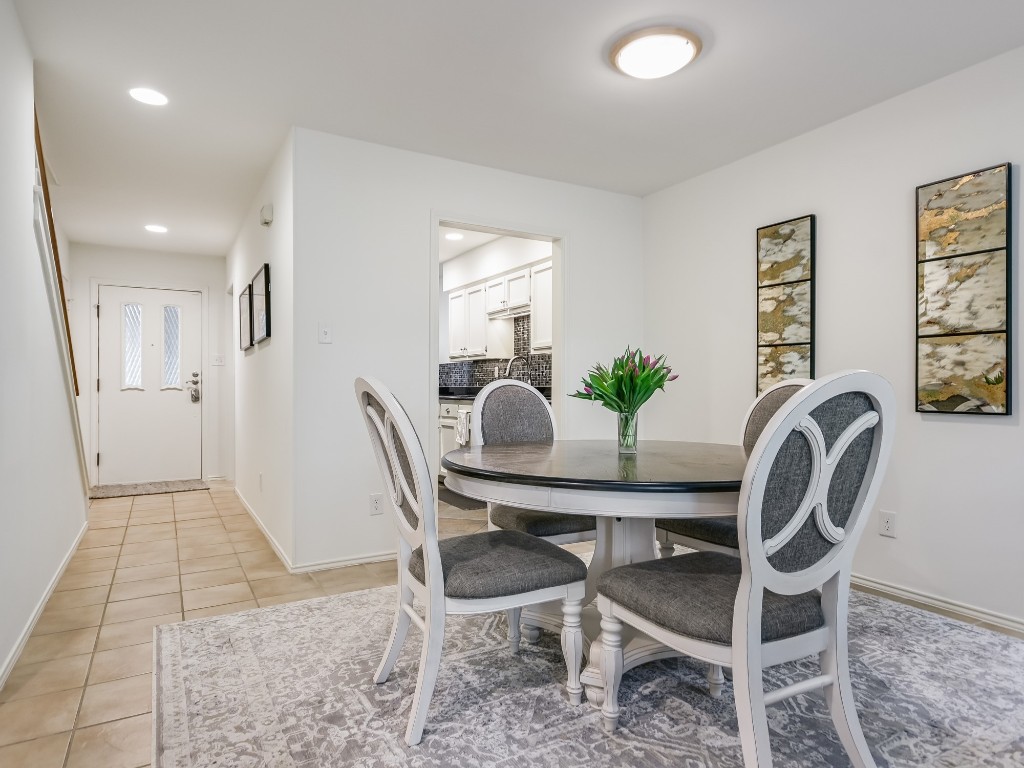 8314 Bent Tree Road Austin, TX 78759 - Photo 3 of 15 Dining room with light tile patterned floors and recessed lighting