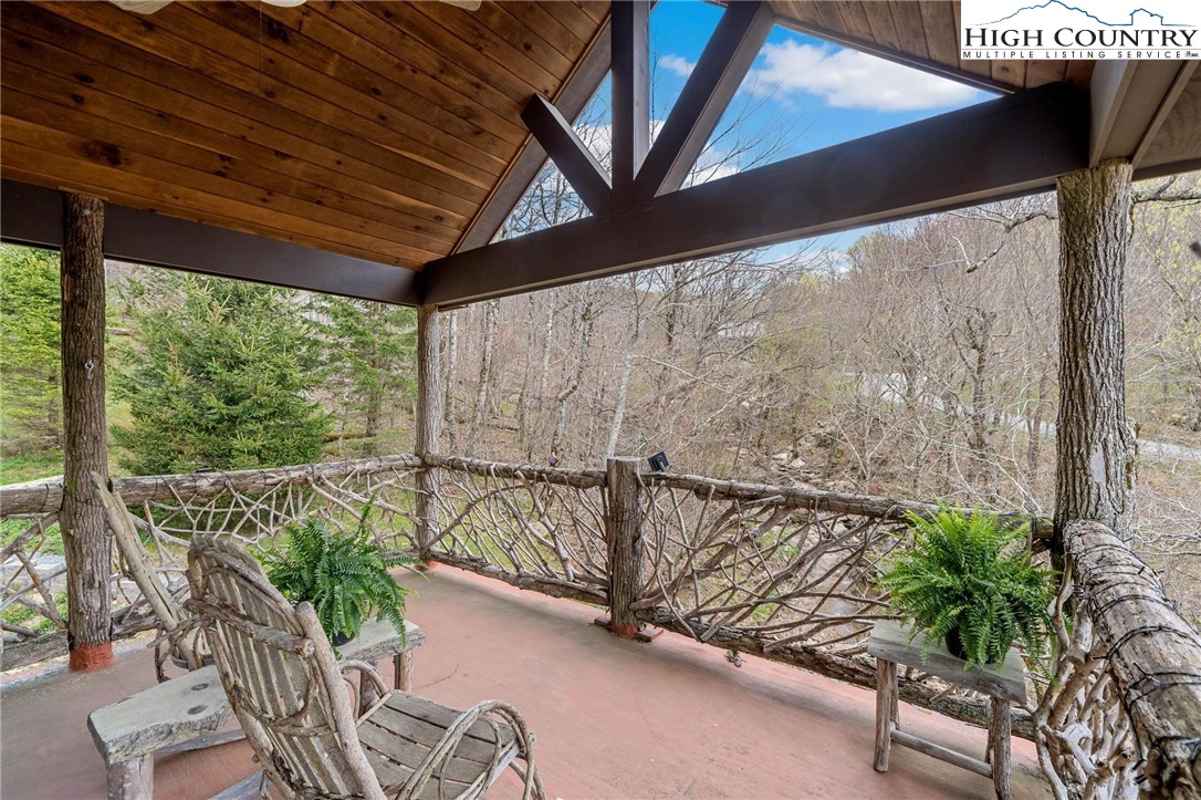 140 Spruce Hollow Road Beech Mountain, NC 28604 - Photo 24 of 50 a view of balcony with furniture