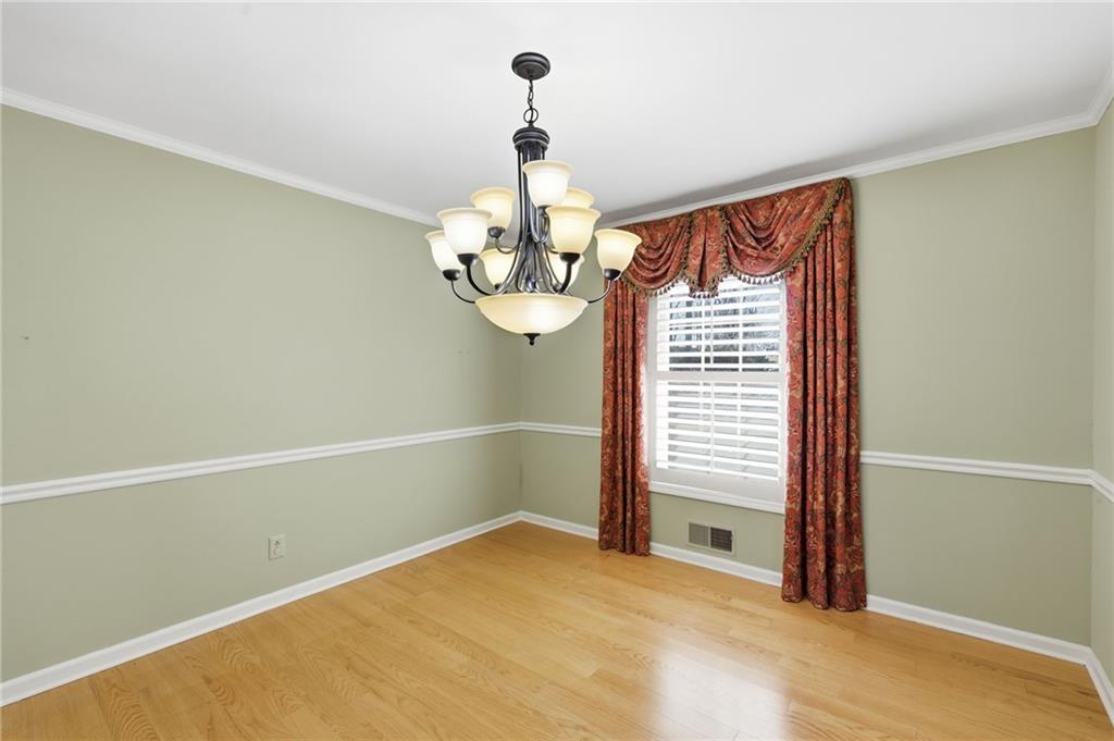 2224 Colonial Drive Gainesville, GA 30501 - Photo 15 of 40 a view of a room with a chandelier