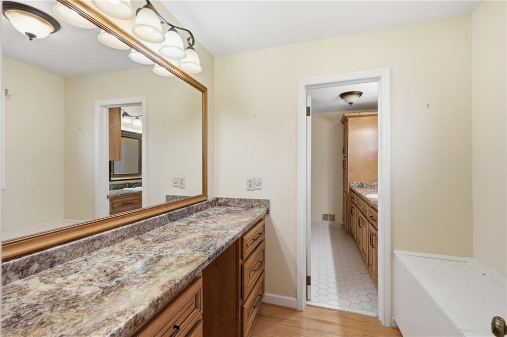 2224 Colonial Drive Gainesville, GA 30501 - Photo 23 of 40 a view of a kitchen cabinets and a wooden floor