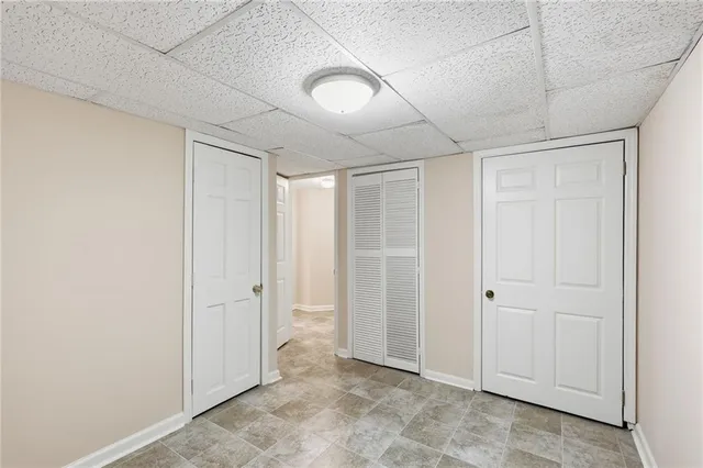 a view of a hallway with closet area