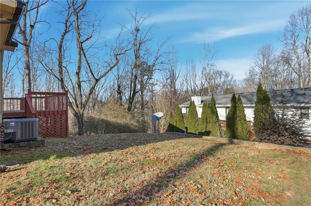 2224 Colonial Drive Gainesville, GA 30501 - Photo 3 of 40 a view of a yard with snow on the road
