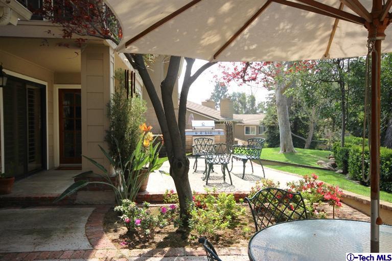 2041 Rosemont Avenue, Unit 2 Pasadena, CA 91103 - Photo 2 of 18 a view of a chairs and table in a backyard