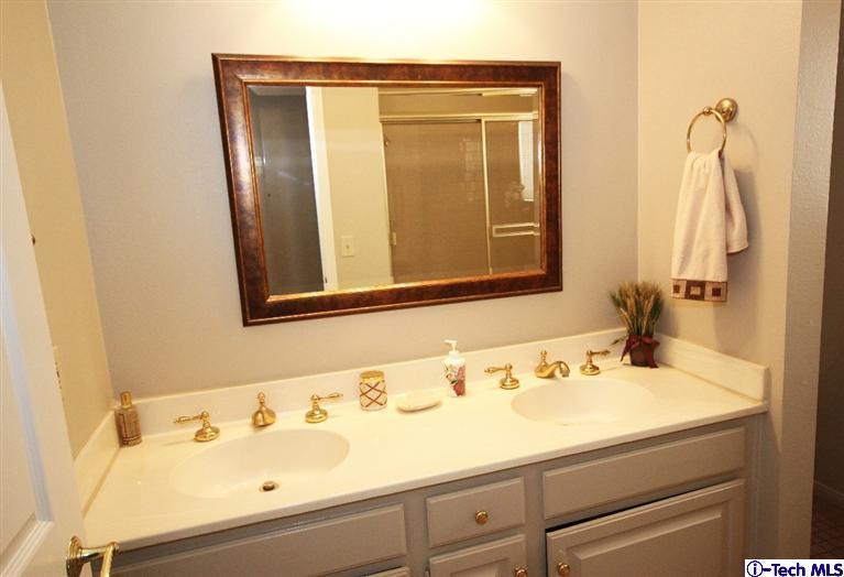 2041 Rosemont Avenue, Unit 2 Pasadena, CA 91103 - Photo 13 of 18 a bathroom with a sink and a mirror