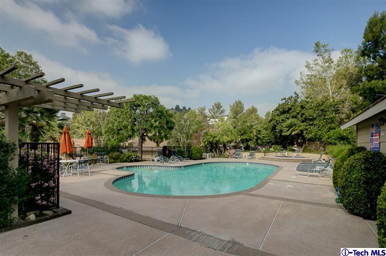 2041 Rosemont Avenue, Unit 2 Pasadena, CA 91103 - Photo 16 of 18 a view of a swimming pool with a patio