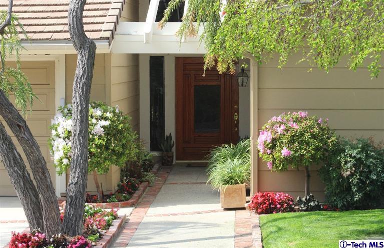 2041 Rosemont Avenue, Unit 2 Pasadena, CA 91103 - Photo 3 of 18 a front view of a house with garden