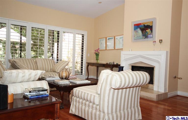 2041 Rosemont Avenue, Unit 2 Pasadena, CA 91103 - Photo 5 of 18 a living room with furniture fireplace and a large window