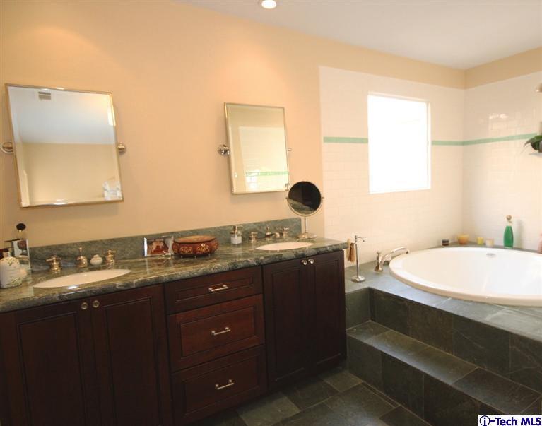 2041 Rosemont Avenue, Unit 2 Pasadena, CA 91103 - Photo 9 of 18 a bathroom with a sink and a mirror