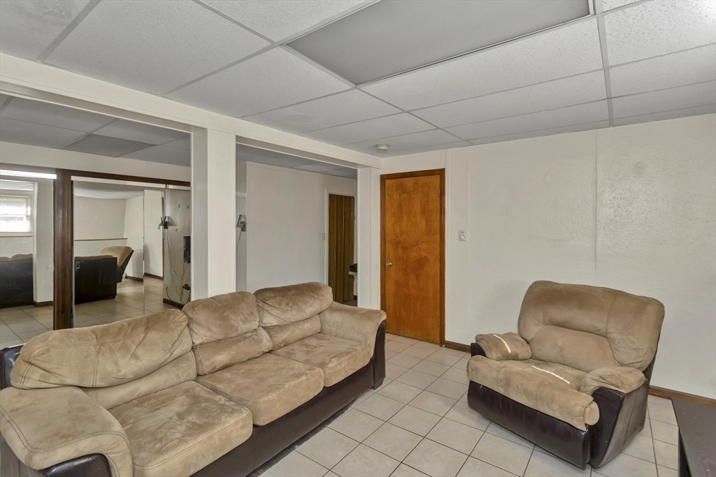 212 Poplar Street Chicopee, MA 01013 - Photo 15 of 22 a living room with furniture and a couch