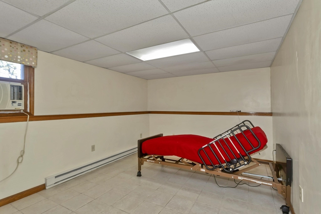 212 Poplar Street Chicopee, MA 01013 - Photo 17 of 22 a room with furniture and air hockey table