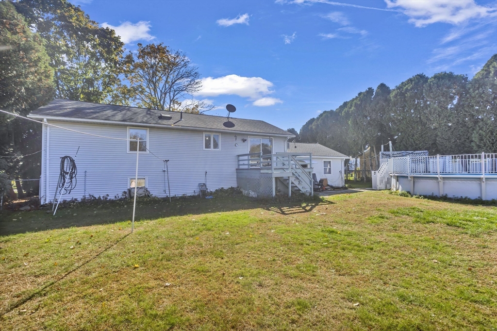 212 Poplar Street Chicopee, MA 01013 - Photo 21 of 22 a view of a house with a yard