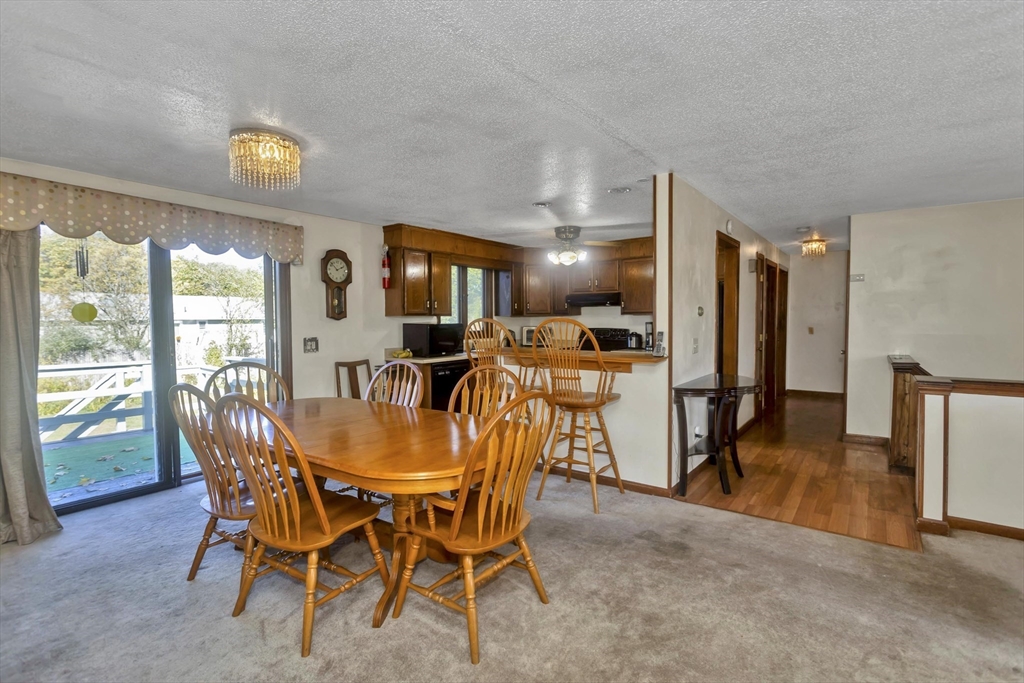 212 Poplar Street Chicopee, MA 01013 - Photo 5 of 22 a dining room with furniture and window