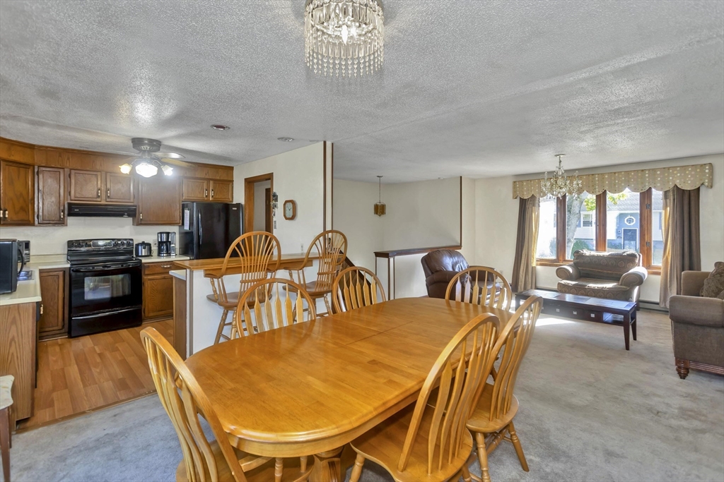 212 Poplar Street Chicopee, MA 01013 - Photo 6 of 22 a view of a dining room with furniture