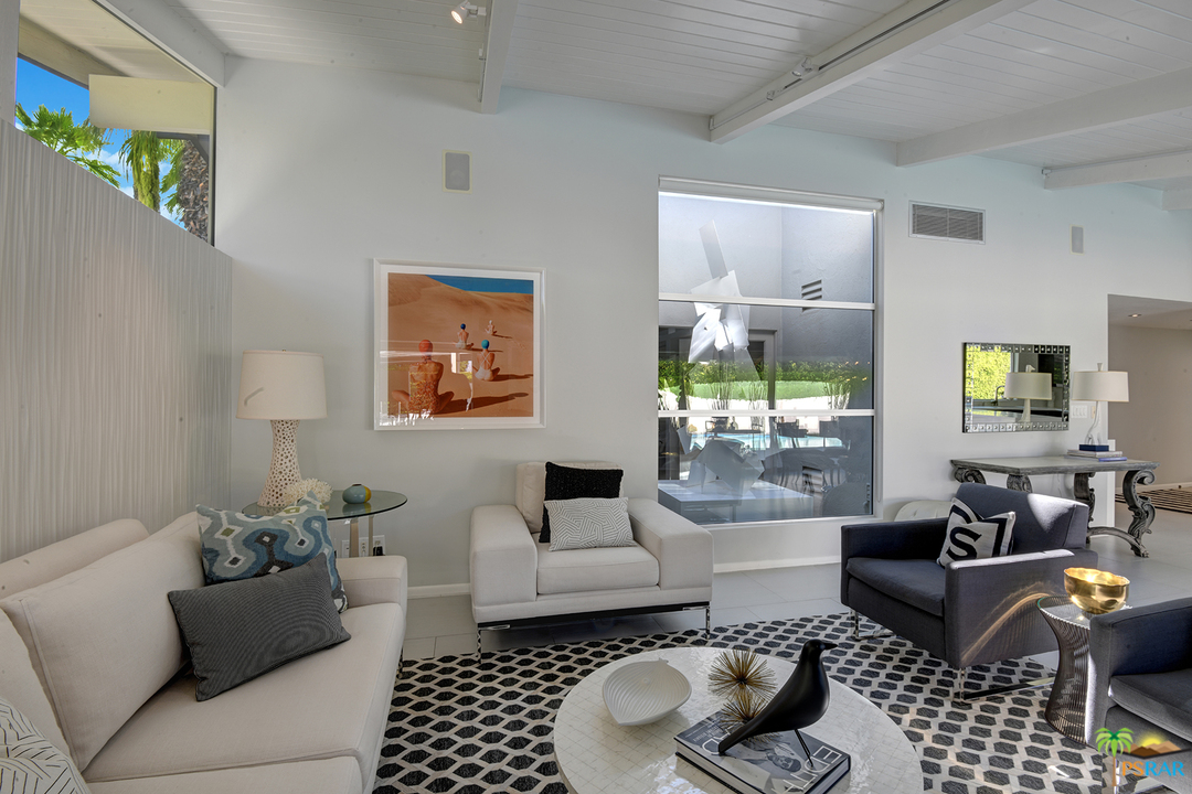 984 East La Jolla Road Palm Springs, CA 92264 - Photo 11 of 53 a living room with furniture and a potted plant