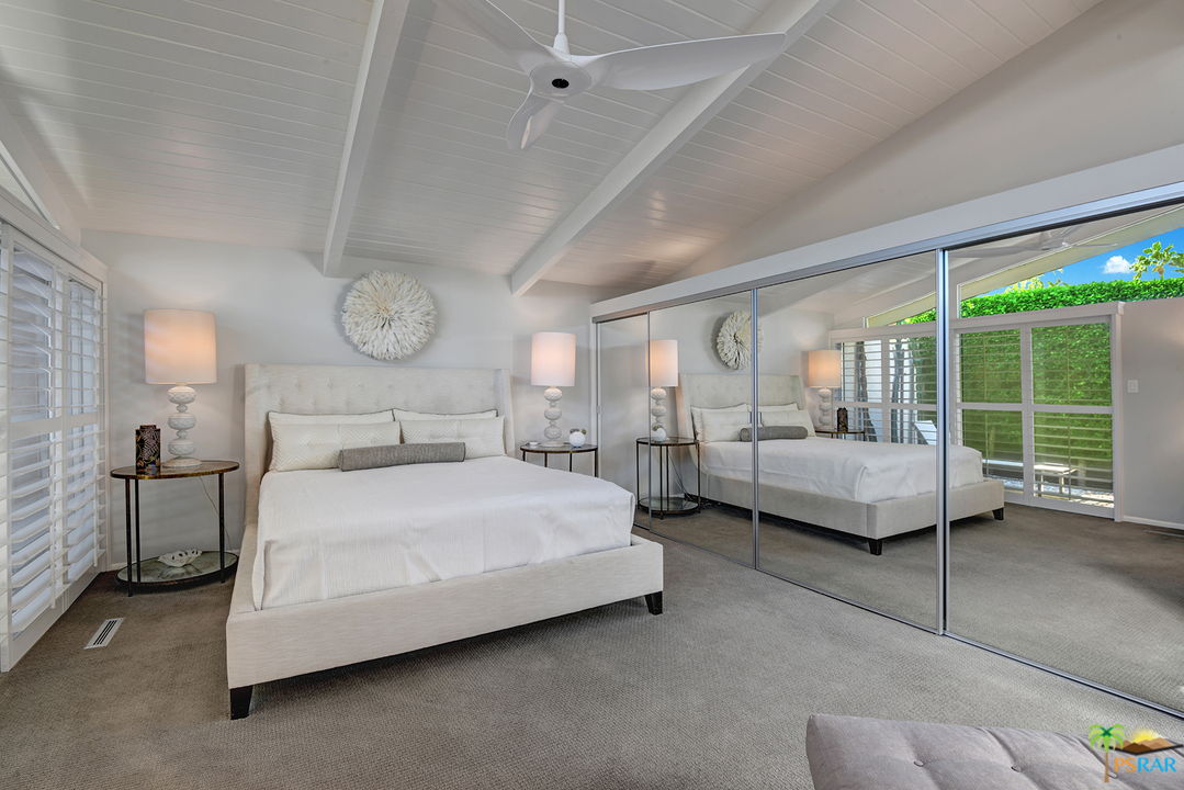 984 East La Jolla Road Palm Springs, CA 92264 - Photo 20 of 53 a bedroom with bed and a large window