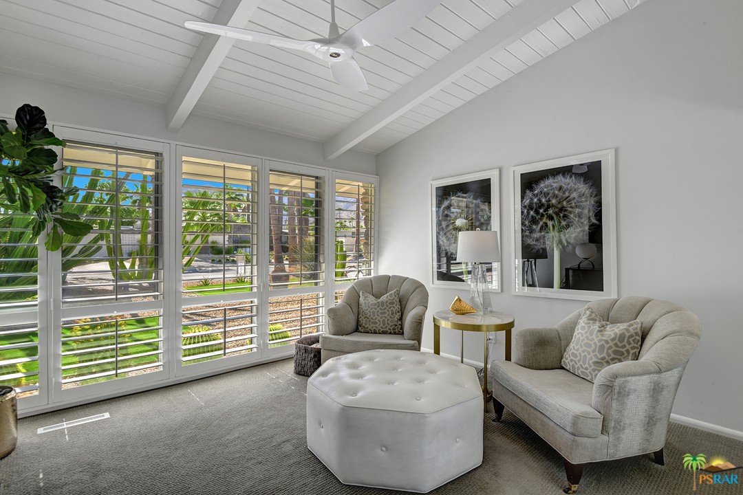 984 East La Jolla Road Palm Springs, CA 92264 - Photo 22 of 53 a living room with furniture and a large window