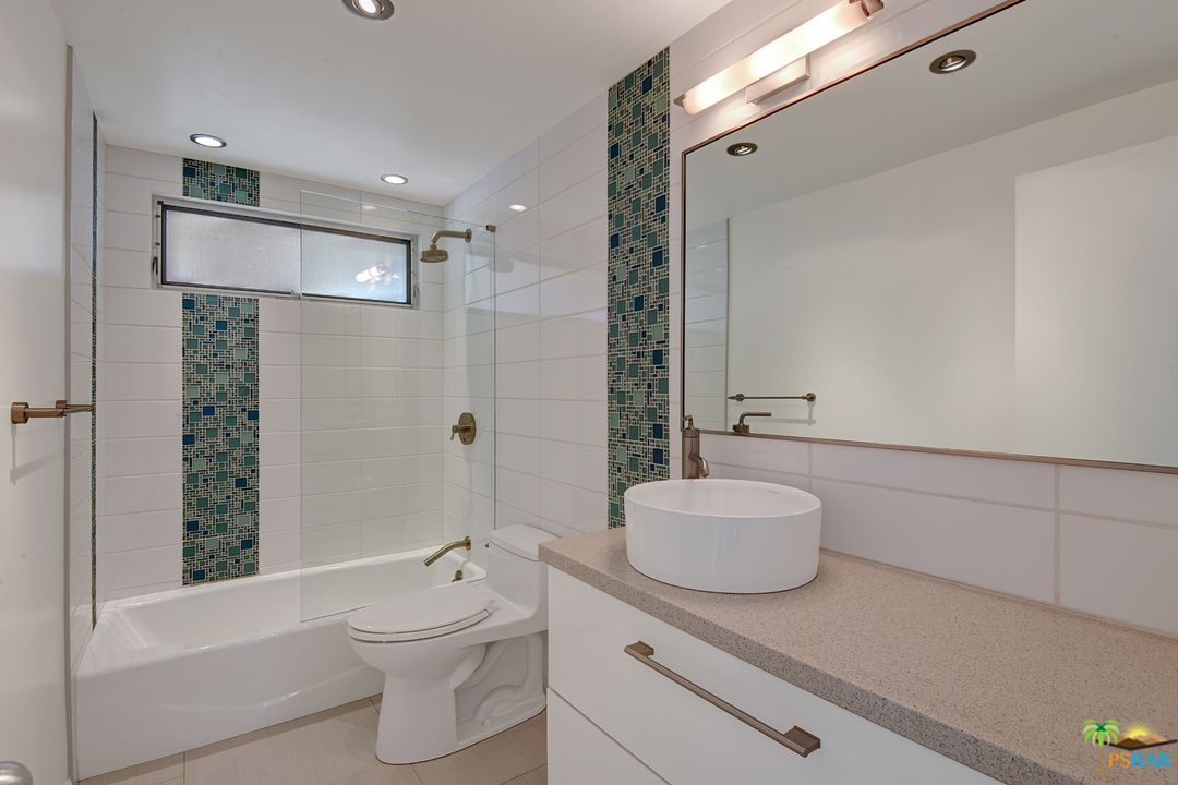 984 East La Jolla Road Palm Springs, CA 92264 - Photo 27 of 53 a bathroom with a sink a toilet and shower