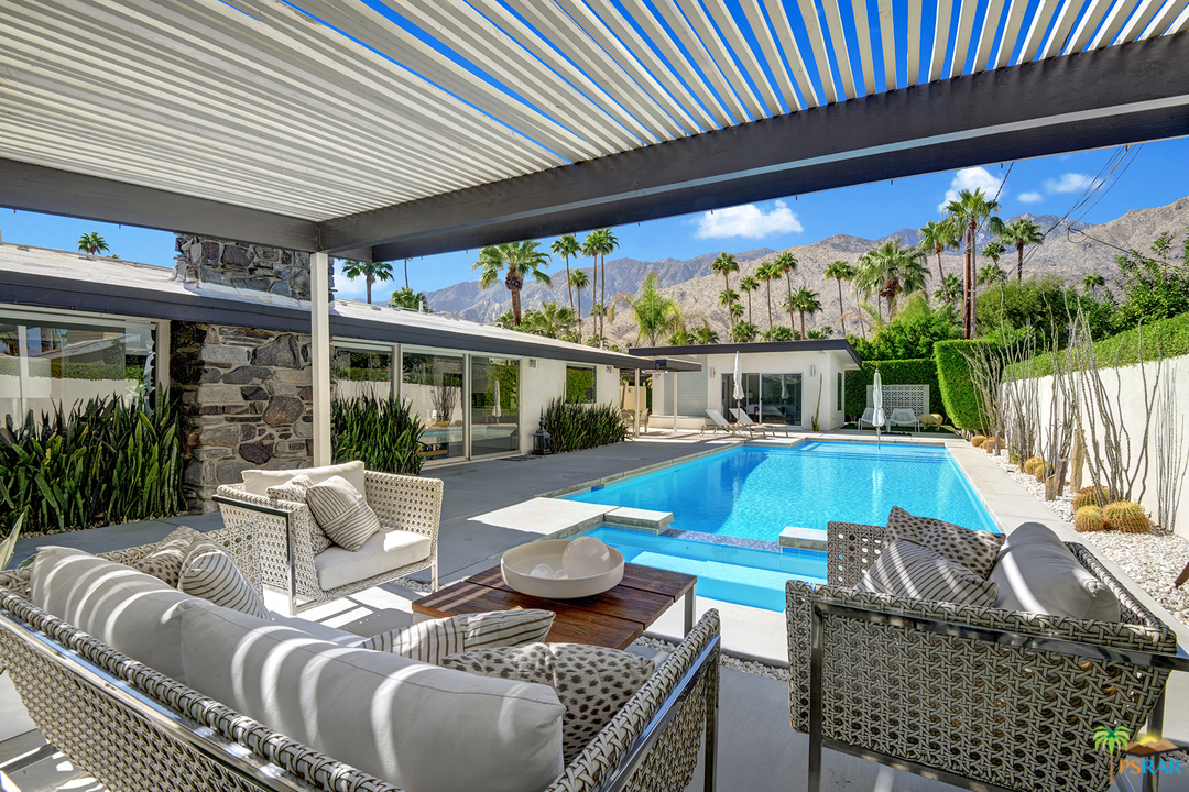 984 East La Jolla Road Palm Springs, CA 92264 - Photo 30 of 53 a view of balcony with furniture and garden view