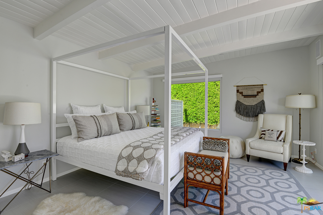 984 East La Jolla Road Palm Springs, CA 92264 - Photo 34 of 53 a bedroom with a bed and a window