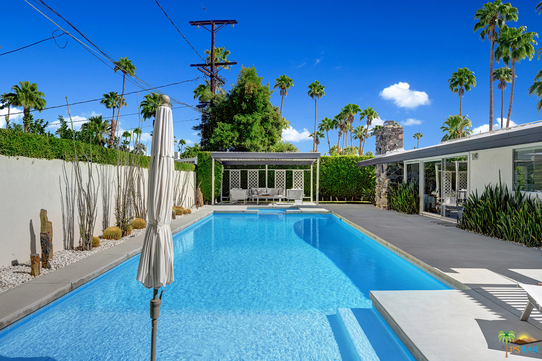 984 East La Jolla Road Palm Springs, CA 92264 - Photo 35 of 53 a view of house with swimming pool outdoor seating