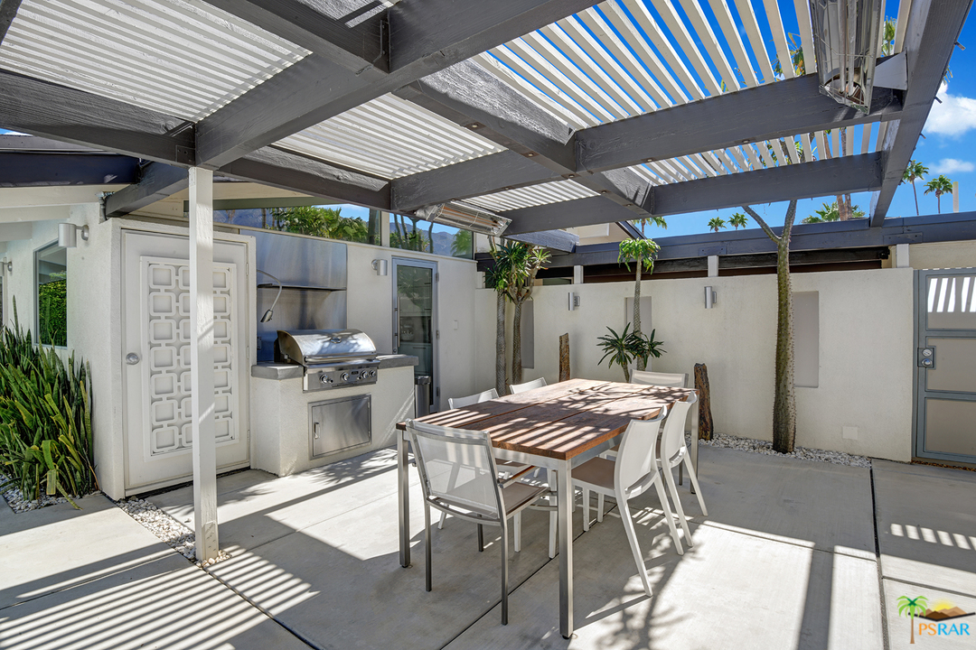 984 East La Jolla Road Palm Springs, CA 92264 - Photo 39 of 53 a patio with table and chairs